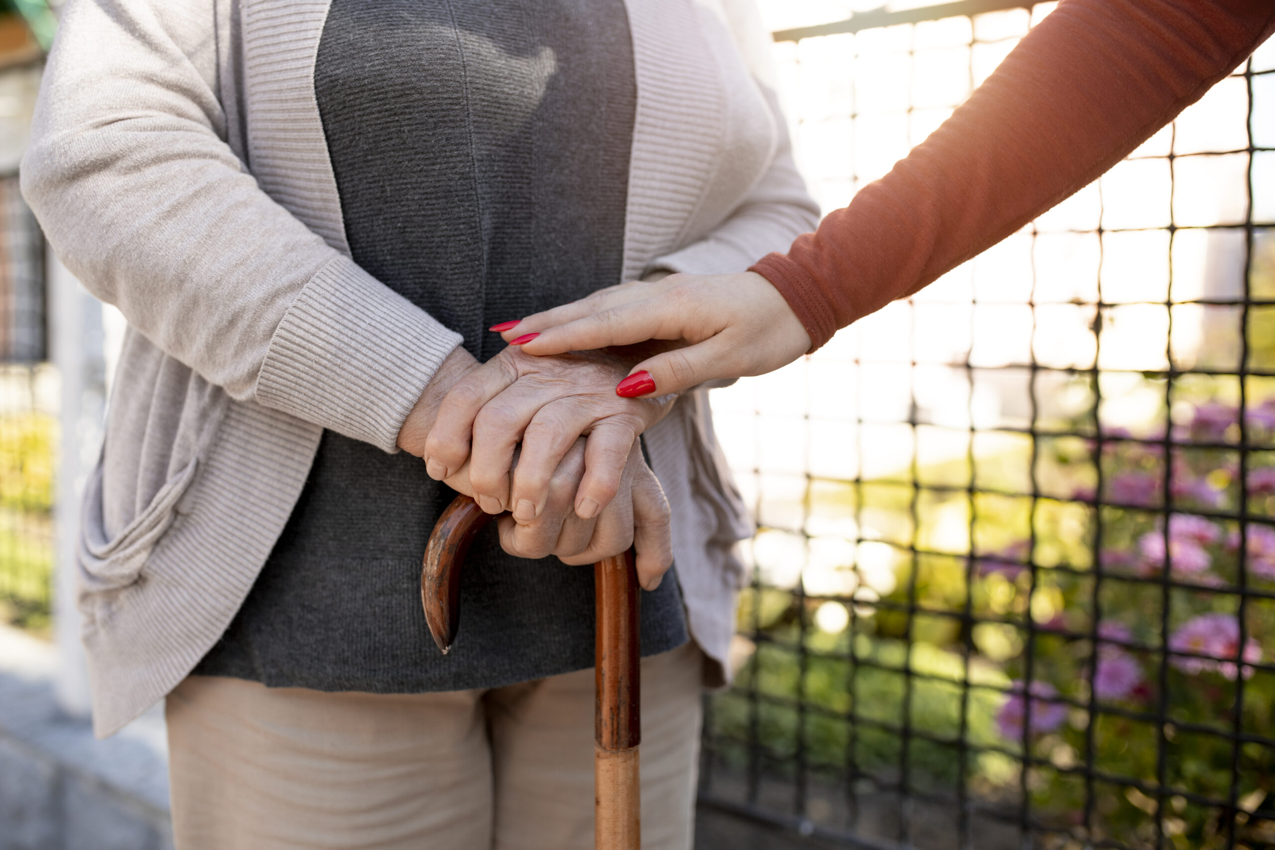 person-helping-their-elder-neighbour